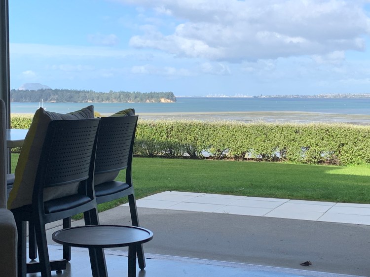 The expansive view from the lounge of Mangawhai Bay BnB extends from Matakana island right around to Tauranga city